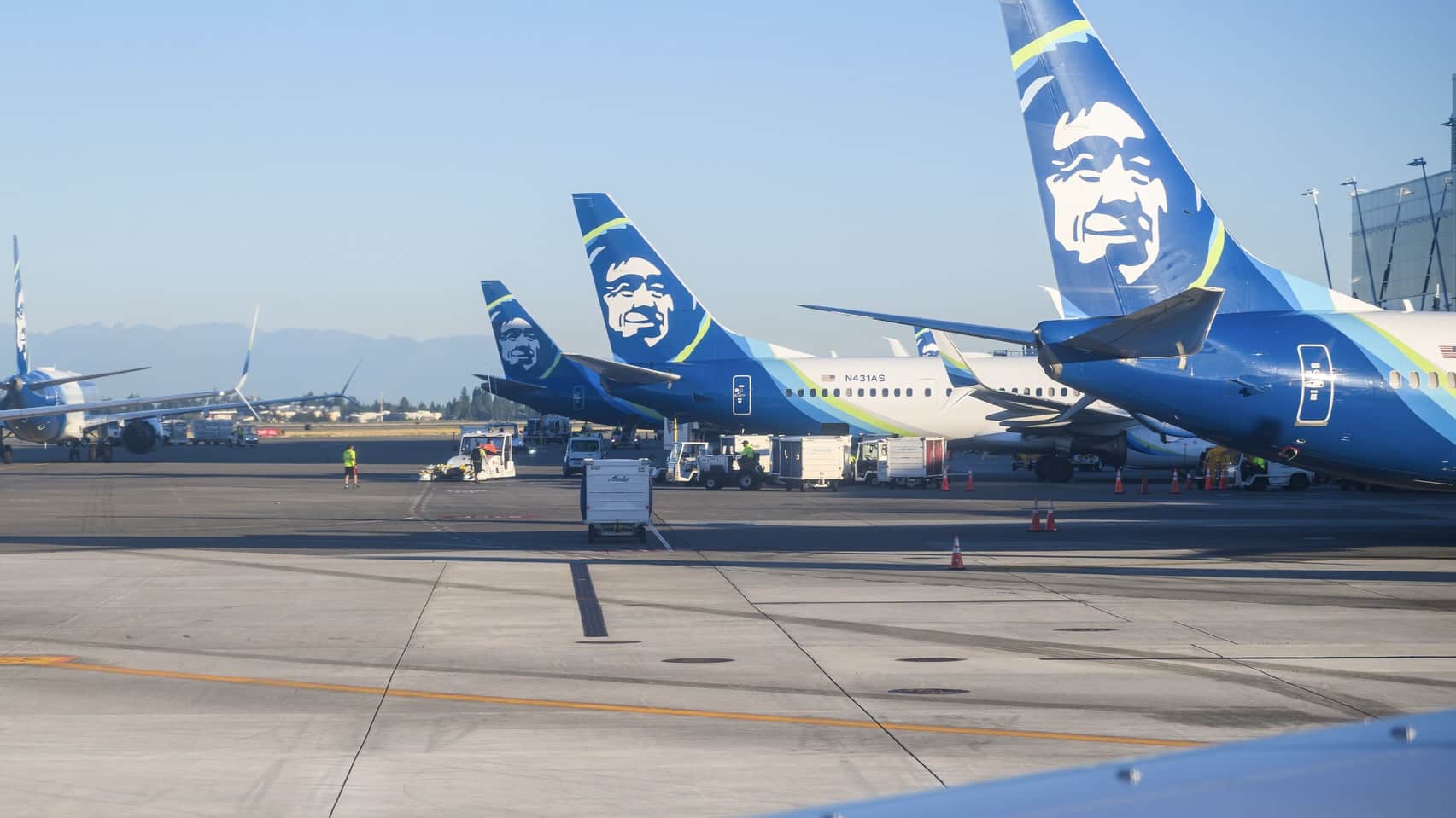 Alaska Airline Airplanes At Seattle Tacoma International Airport. Vertical Format.